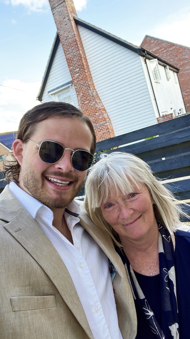 Ben with his mum, Patricia, arm in arm outside