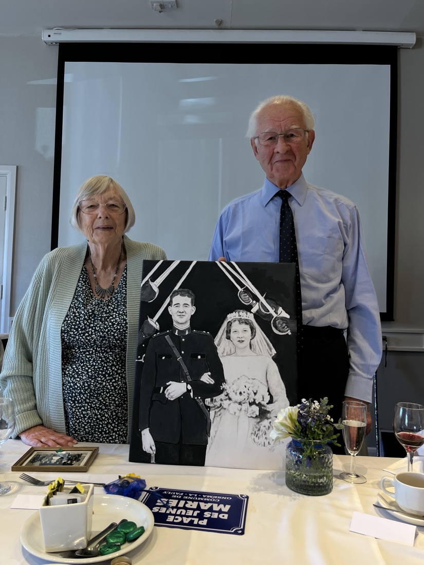 A commissioned wedding-day portrait painting, delivered to the happy clients
