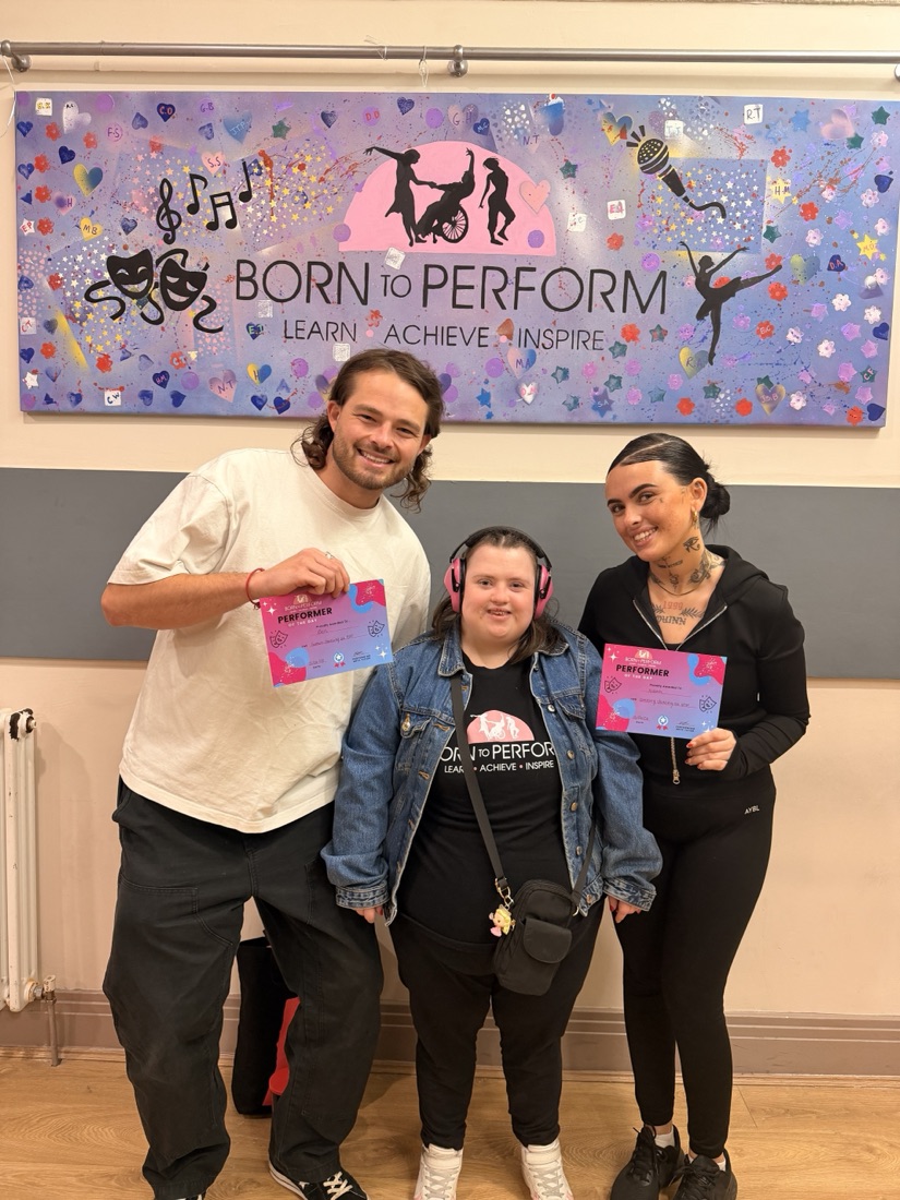 Ben and Niamh with a Born to Perform performer holding their certificates