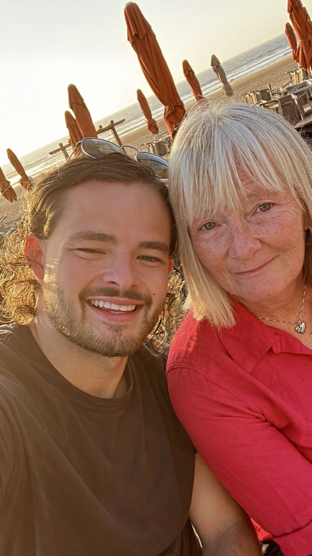 Ben with his mum, Patricia, on the beach together