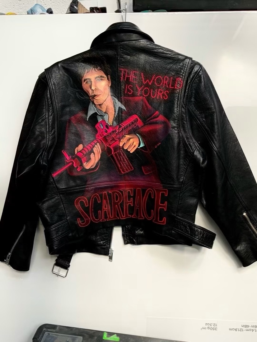 A leather jacket hand-painted by Niamh with a Scarface design