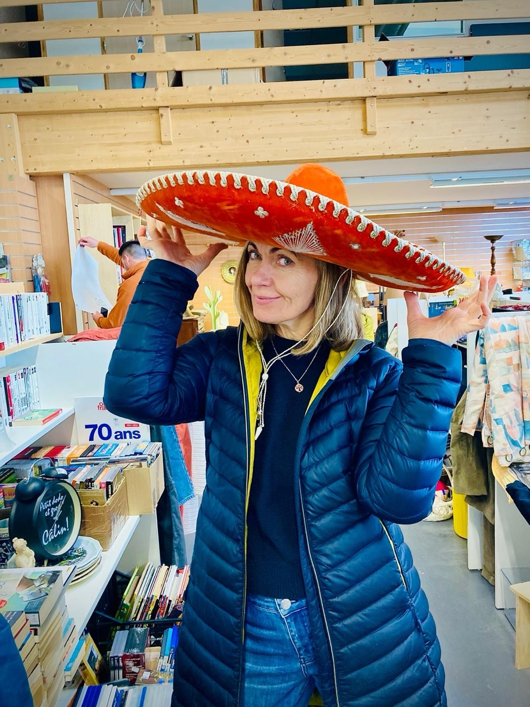 Niamh’s mum, Patricia, playfully trying on a big sombrero in a French shop