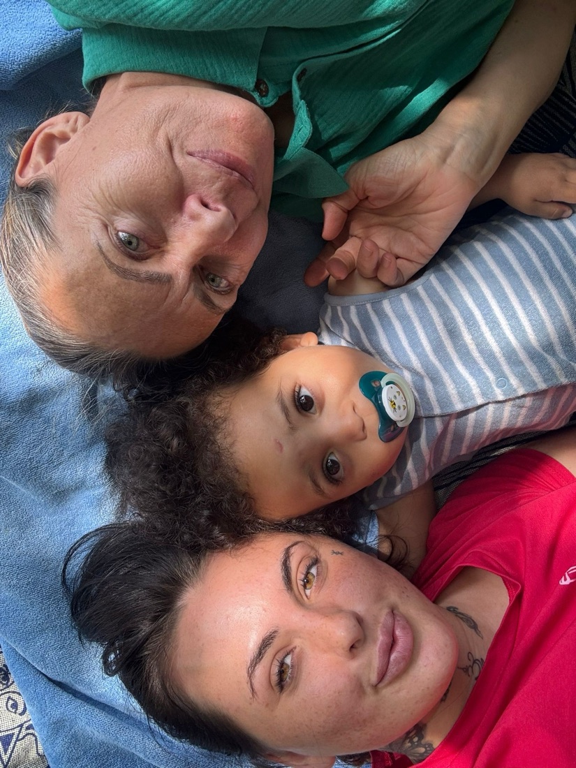 Three generations, Niamh, her mum Patricia, and Jacques lying together