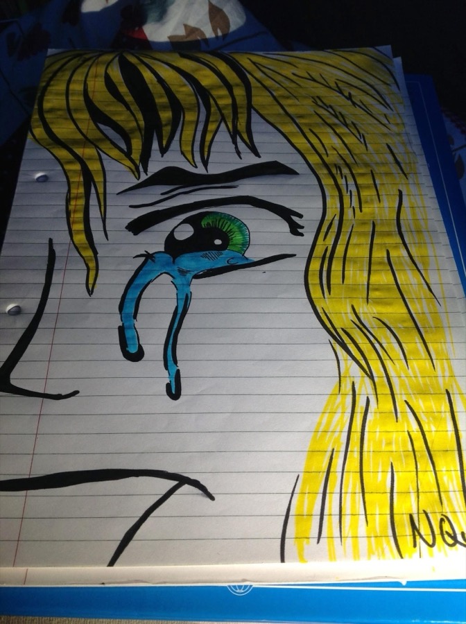 An early marker drawing by Niamh, a girl with yellow hair and a blue tear