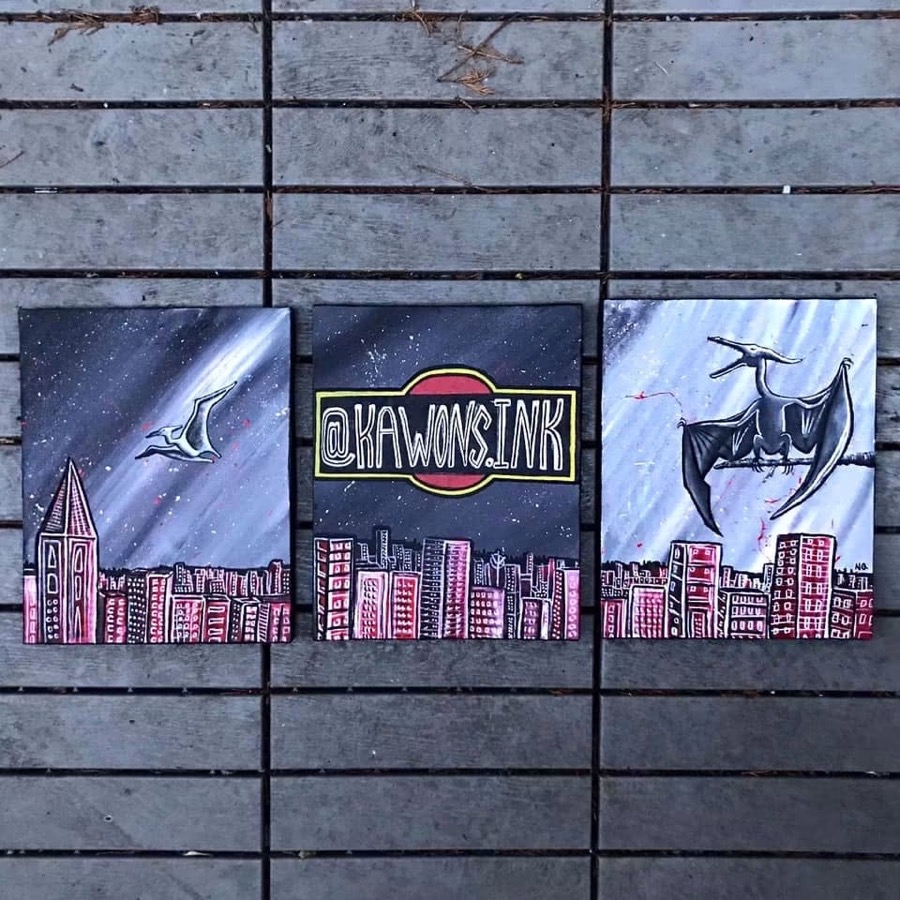 Three painted canvases by Niamh, pterodactyls over a pink cityscape