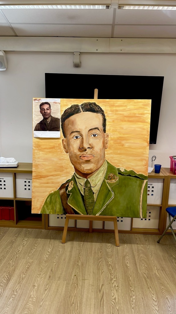 Walter Tull portrait painted by Patricia Studios students during a school workshop